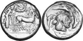 Sicily. Syracuse. Hieron I (478-466 BC). AR Tetradrachm, struck c. 475-470 BC. Obv. Charioteer, holding kentron and reins, driving slow quadriga right...