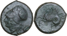 Sicily. Syracuse. Dionysios I (405-367 BC). AE Litra, 409-395 BC. Obv. Head of Athena left, wearing helmet decorated with olive wreath. Rev. Hippocamp...