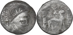 Yuezhi. Sapalbizes (Sapadbizes). AR Hemidrachm, late 1st century BC. Obv. CAΠAΛBIZHC. Helmeted and draped bust right. Rev. NANAIA / NANAIA. Lion stand...