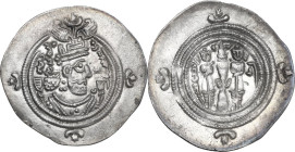 Greek Asia. Sasanian Kings. Khusro II (591-628). AR Drachm. Obv. Bust of Khusro II right, wearing winged crown. Rev. Fire altar flanked by two attenda...