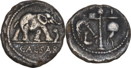 Caius Julius Caesar. AR Denarius, mint moving with Caesar, 49-48 BC. Obv. Elephant advancing right, trampling on horned snake; in exergue, CAESAR. Rev...