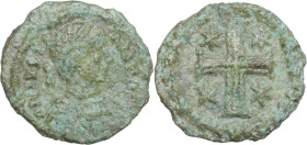 Justinian I (527-565). AE Decanummium. Ravenna mint, c. 540-547 AD. Obv. Helmeted and cuirassed bust facing, holding globus cruciger and shield. Rev. ...
