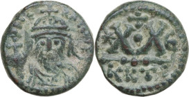 Heraclius (610-641). AE Half follis, Carthage mint. Obv. Helmeted and cuirassed bust facing, holding globus cruciger. Rev. XX (mark of value) flanked ...