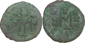 Heraclius, with Heraclius Constantine and Heraclonas (610-641). AE Follis, Ravenna mint. Obv. Heraclius flanked by his sons Heraclius Constantine and ...