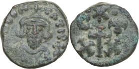 Constans II (641-668). AE Half follis, Carthage mint. Obv. Crowned bust facing, wearing consular robe, holding mappa and globus cruciger. Rev. Cross d...