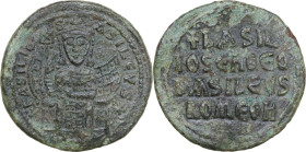 Basil I the Macedonian (867-886). AE Follis. Constantinople mint. Struck 879-886. Obv. + ЬASILIOS ЬASILЄVS ✷. Crowned figure of Basil enthroned facing...