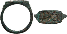 ITALIC BRONZE RING Italic, Central Italy, c. 7th - 6th century BC. Bronze ring with an orientalizing engraving of a lion. Dimensions: 24 mm. Inner siz...