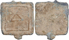 LEAD WEIGHT Greek world, c. 5th - 4th century BC. Lead weight for Tetradrachms of Attic standard. In relief: Δ within a square line. Dimensions: 31 x ...