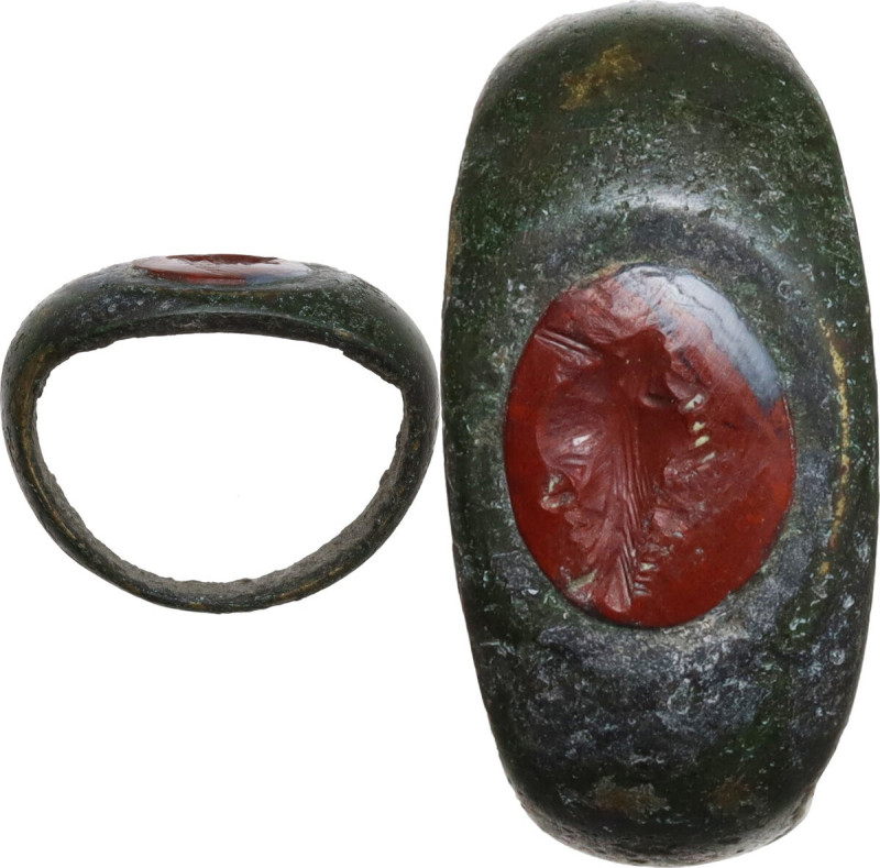 ROMAN RING WITH 'GRILLOS' Bronze ring with carnelian intaglio engraved with 'gri...