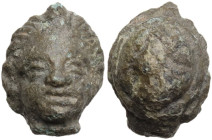 BRONZE FEMALE HEAD Roman period, 1st-3rd century AD. Diademed bronze female head. Dimension: 19x15 mm.