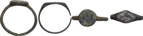 TWO LATE ANTIQUE RINGS Late Roman Period, c. 4th-5th century AD. Lot of two (2) Roman rings, one in silver engraved with a schematized depiction of a ...