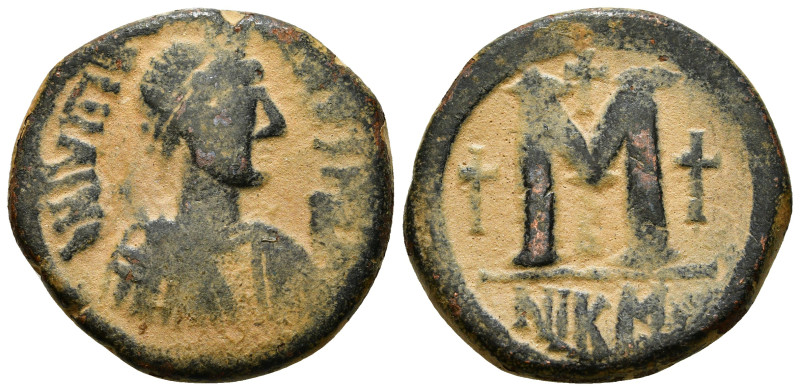 JUSTIN I & JUSTINIAN I (527). Follis. Nicomedia.
Obv: D N IVSTIN IVSTINIA.
Diade...