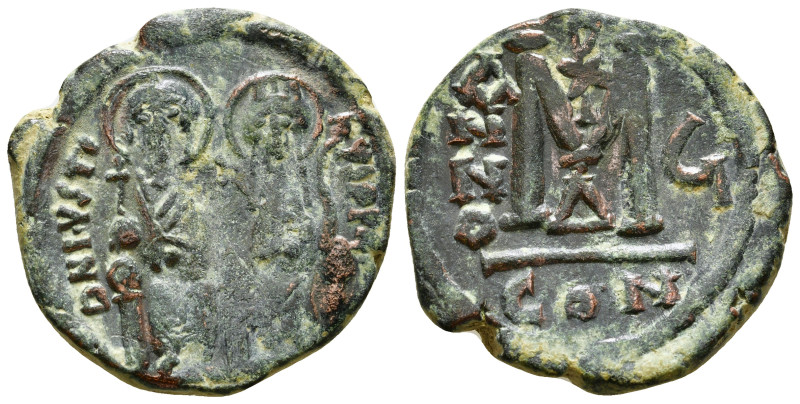 JUSTIN II, with SOPHIA (565-578). Follis. 
Obv: D N IVSTINVS PP AVG.
Justin and ...