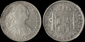 MEXICO: 8 Reales (1802Mo FT) in silver (0,896). Armored bust of Charles IIII facing right on obverse. Crowned shield flanked by pillars with banner on...
