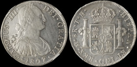 MEXICO: 8 Reales (1807Mo TH) in silver (0,896). Armored bust of Charles IIII facing right on obverse. Crowned shield flanked by pillars with banner on...