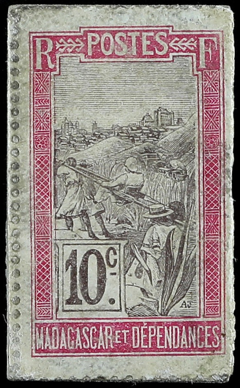 MADAGASCAR
10 centimes type “Chien” ND (1916).
P.003.
Timbre monnaie rouge avec ...