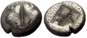 Lesbos. Uncertain mint AR )bol (Silver, 0.55g, 7mm) ca 500-450 BC.
Obv: Confronted boars' heads 
Rev: Quadripartite incuse square.
Ref: Klein 348.