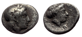 Lesbos, Mytilene AR Diobol (Silver, 1.19g, 11mm) ca 400-350 BC 
Obv: Laureate head of Apollo right. 
Rev: MY (?) Female head right; torch (?) to right...
