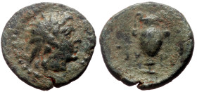 Aeolis, Myrina AE (Bronze, 13mm, 1.45g) 2nd-1st century BC
Obv: Radiate head of Helios to right. 
Rev: MY-PI Amphora. 
Ref: SNG Copenhagen 226, SNG Mü...