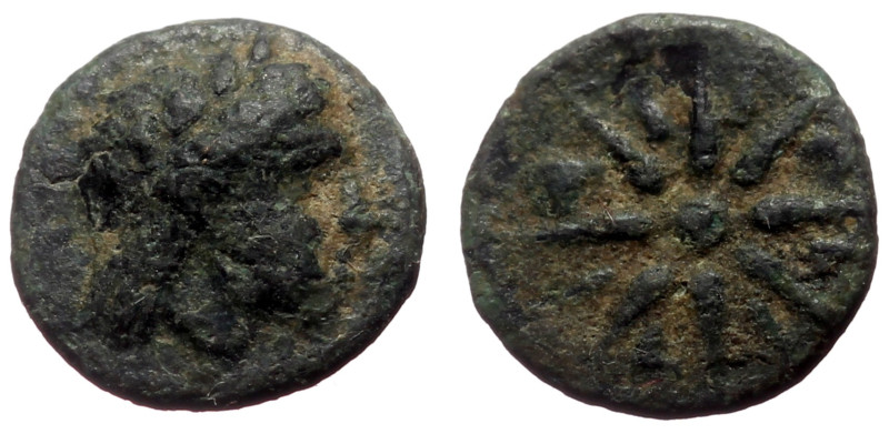 Mysia, Gambrion AE (Bronze, 0.66g, 10mm) ca 350-250 BC.
Obv: Laureate head of Ap...