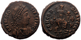 Theodosius I (379-395) AE (Bronze, 2.60g, 17mm) Antioch Obv: DN THEODOSIVS PF AVG, pearl diademed, draped and cuirassed bust right 
Rev: CONCORDIA AVG...