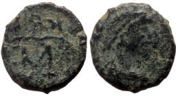 Theodosius II (402-450) AE Nummus (Bronze, 0.94g, 11mm) Constantinople (?)
Obv: Diademed, draped and cuirassed bust right 
Rev: monogram within wreath...