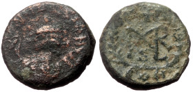 Marcian (450-457) AE Nummus (Bronze, 11mm, 0.99g) Constantinople. 
Obv: Diademed, draped, and cuirassed bust right 
Rev: Marcian monogram; cross above...
