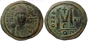 Justinian I (527-565) Æ Follis (Bronze, 22.52g, 42mm) Constantinople, Dated RY 12 (538/9). 
Obv: DN IVSTINIANVS P P AVG, Diademed, helmeted, and cuira...
