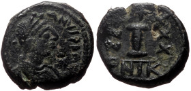 Justinian I (527-565) AE Decanummium 
(Bronze, 3.69g, 16mm) Nikomedia 
Obv: Diademed, draped, and cuirassed bust right 
Rev: Large I; star above, A/N/...