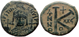 Justinian I (527-565) AE Half Follis (Bronze, 9.52g, 26mm) Theoupolis (Antioch). 
Obv: D N IVSTINIANVS P P AVG, Helmeted and cuirassed bust of Justini...