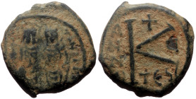 Justin II, with SOPHIA (565-578) AE Half Follis (Bronze, 20mm, 6.33g) Thessalonica, Year 5 (569/70). 
Obv: Nimbate Justin II, holding globus cruciger,...