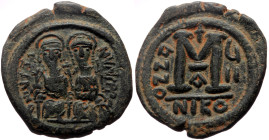 Justin II (565-578) AE Follis (Bronze, 13.72g, 31mm) Nicomedia, Dated RY 7 (571/2) 
Obv: D N IVSTINVS P P AV, Justin and Sophia enthroned facing, both...