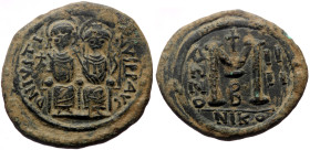 Justin II (565-578) AE Follis (Bronze, 35mm, 13.84g) Nicomedia, 2nd officina. Dated RY 4 (568/9). 
Obv: Justin and Sophia seated facing on double thro...