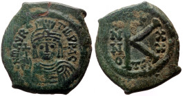 Maurice Tiberius (582-602) AE half follis (Bronze, 5.86g, 23mm) Thessalonica, year 20 = 601/602. 
Obv: D N MAVRC TIB PP AV, helmeted and cuirassed bus...