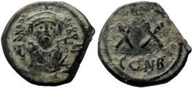 Phocas (602-610) AE Half Follis (Bronze, 6.00g, 23mm) Constantinople. 
Obv: δ N FOCA PЄRP AVG Crowned bust facing, wearing consular robes, holding map...