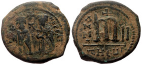 Phocas (602-610) AE Follis (Bronze, 27mm, 10.62g) Antioch, Year 2 = 603/604. 
Obv: O N FOCA NЄ PЄ AV, Phocas on left and Leontia on right, standing fa...