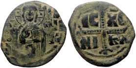 Michael IV the Paphlagonian (1034-1041) AE Follis (Bronze, 7.76g, 30mm) 
Obv: + EMMA-NOVHL around, IC-XC to right and left of Christ, with nimbate cro...