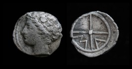 GAUL, Massalia, c. 350-150 BCE, AR Obol. 0.59g, 10m.
Obv: Youthful male head left (Apollo?)
Rev: Wheel with four spokes; M A within two quarters. 
Dep...