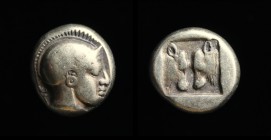 LESBOS, Mytilene: Electrum hekte, c. 454-427 BCE. 2.52g, 10mm.
Obv: Helmeted head of Athena, right.
Rev: Two steer heads confronted within incuse squa...