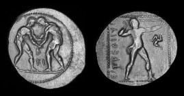 PAMPHYLIA, Aspendos, c. 380/75-330/25 BCE, AR Stater. 10.79g, 25mm.
Obv: Two wrestlers grappling; KI between.
Rev: EΣTFEΔIIY. Slinger in throwing st...
