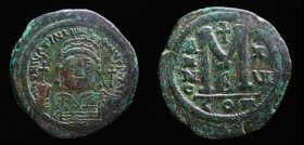Justinian I (527-565), AE Follis, issued 542 - 543. Constantinople, 2nd Officina, 19.18g, 35.5mm.
Obv: D N IVSTINIANVS PP AVG, Helmeted and cuirassed ...