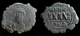 Phocas (602-610), AE follis, issued 605 - 606. Constantinople, 1st Officina, 11.53g, 35mm.
Obv: DN FOCAS PЄRP AUC, Crowned bust facing, wearing consul...