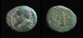 Parthia, Mithradates II (123-88 BCE), AE Hemichalkon. Ecbatana,1.07g, 11.7mm.
Obv: Bearded bust left wearing diadem; behind bust, Greek letter M. 
Rev...