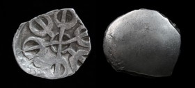 Gandhara Janapada (6th-5th century BCE), AR 1/8 Shatamana. 1.37g, 14mm, scyphate. Good silver.
Obv: 6-armed Gandharan symbol with dot between two arms...