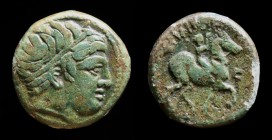 KINGS OF MACEDON, Philip II (359-336 BCE), AE Unit. Macedonian mint, 7.39g, 20.5mm. 
Obv: Head of Apollo right, hair bound in tainia. 
Rev: ΦΙΛΙΠΠΟΥ, ...