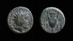 AEOLIS, Myrina ,2nd-1st centuries BCE, AE11. 11mm 
Obv: Radiate head of Helios right. 
Rev: MY-PI Legend around standing Amphora.
SNG München 574; SNG...