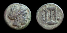 MYSIA, Kyzikos, c. 3rd century BCE, AE18. 5.55g, 18.4mm.
Obv: Head of Kore Soteira wearing corn-wreath and sakkos right. 
Rev: K-Y / Z-I, Tripod; tunn...
