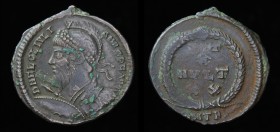 Julian II (361-363), AE3. Antioch, 3.1g, 20.2mm.
Obv: DN FL CL IVLI-ANVS PF AVG, helmeted bust left, holding spear and shield. 
Rev: A wreath encircli...