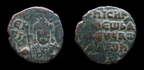 Nicephorus II Phocas (963-969), AE follis. Constantinople.
Obv: Crowned facing bust, wearing loros and additional garment decorated with pearls, holdi...