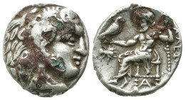 Macedonia. Alexander the Great. (336-323 BC) AR Drachm. Obv: head of Alexander the great right. Rev: sitting Zeus holding eagle and scepter. Weight 2....